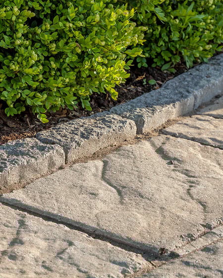 Bordes de piedra Pietra de Techo-Bloc en un diseño de paisaje